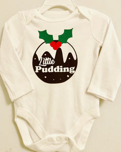 Little pudding on a white bodysuit
