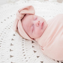 Load image into Gallery viewer, baby in a blush headband
