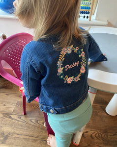 toddler in denim jacket 